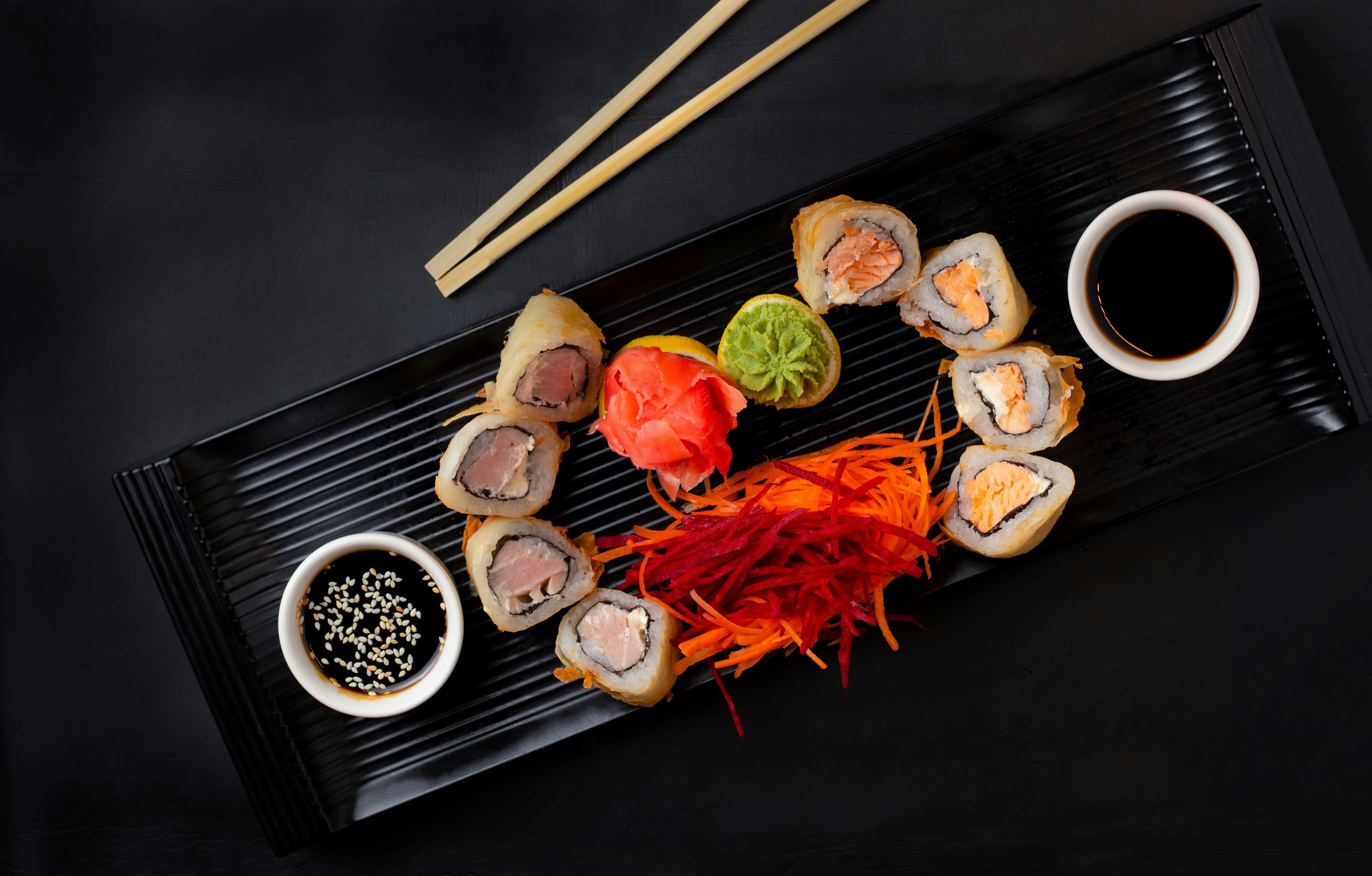 <span color-type="color" style="color: #f0e7d2;"><span style="font-weight: 400;">SALMON &amp; AVOCADO URUMAKI</span></span>
